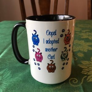 “Oops I adopted another Cat” Mug.